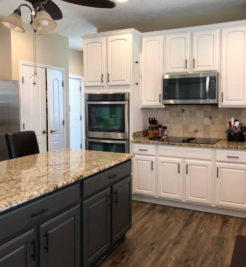 Beautifully refinished kitchen cabinets after painting by DOC Painting