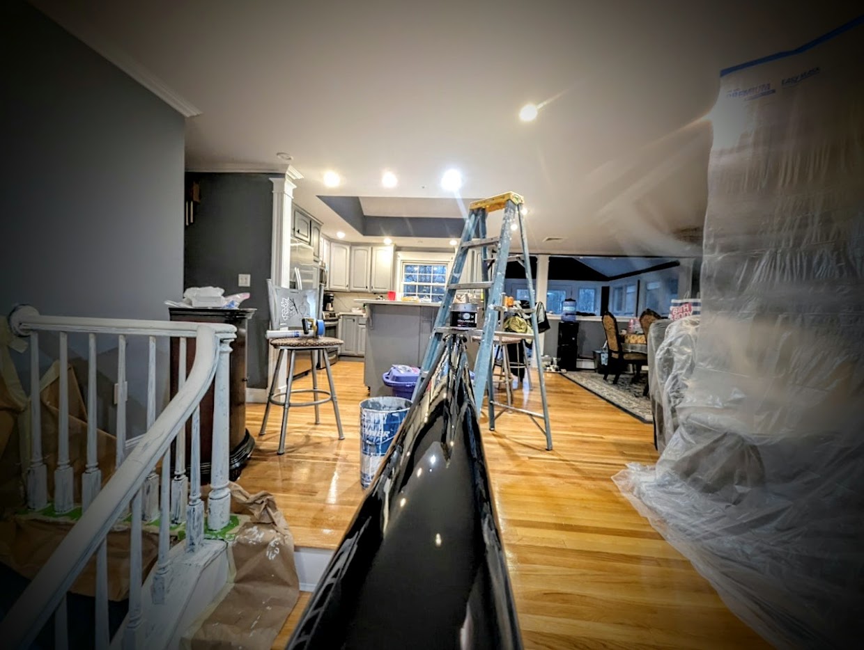 Specialty high-gloss finish on an interior railing with Fine Paints of Europe